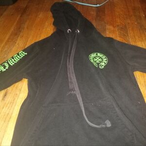 A Black Chrome Hearts with Green Graphics